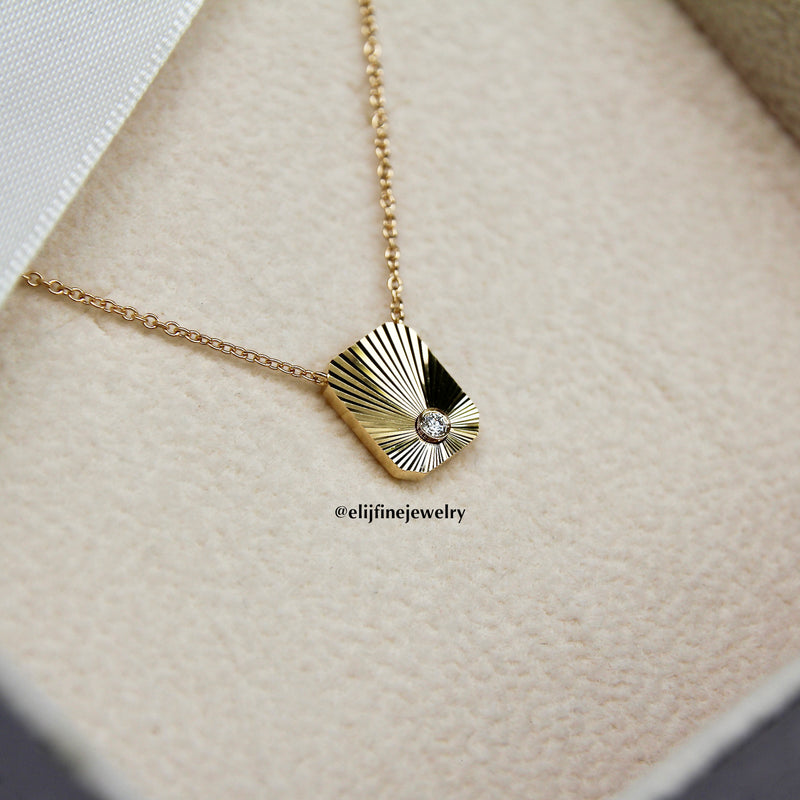 Sunburst Collection: "Captivated" Black Mother-of-Pearl Sun Rays 18K Yellow Gold Pendant