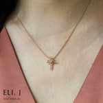 The Nails: Diamond 18K Rose Gold Cross Necklace